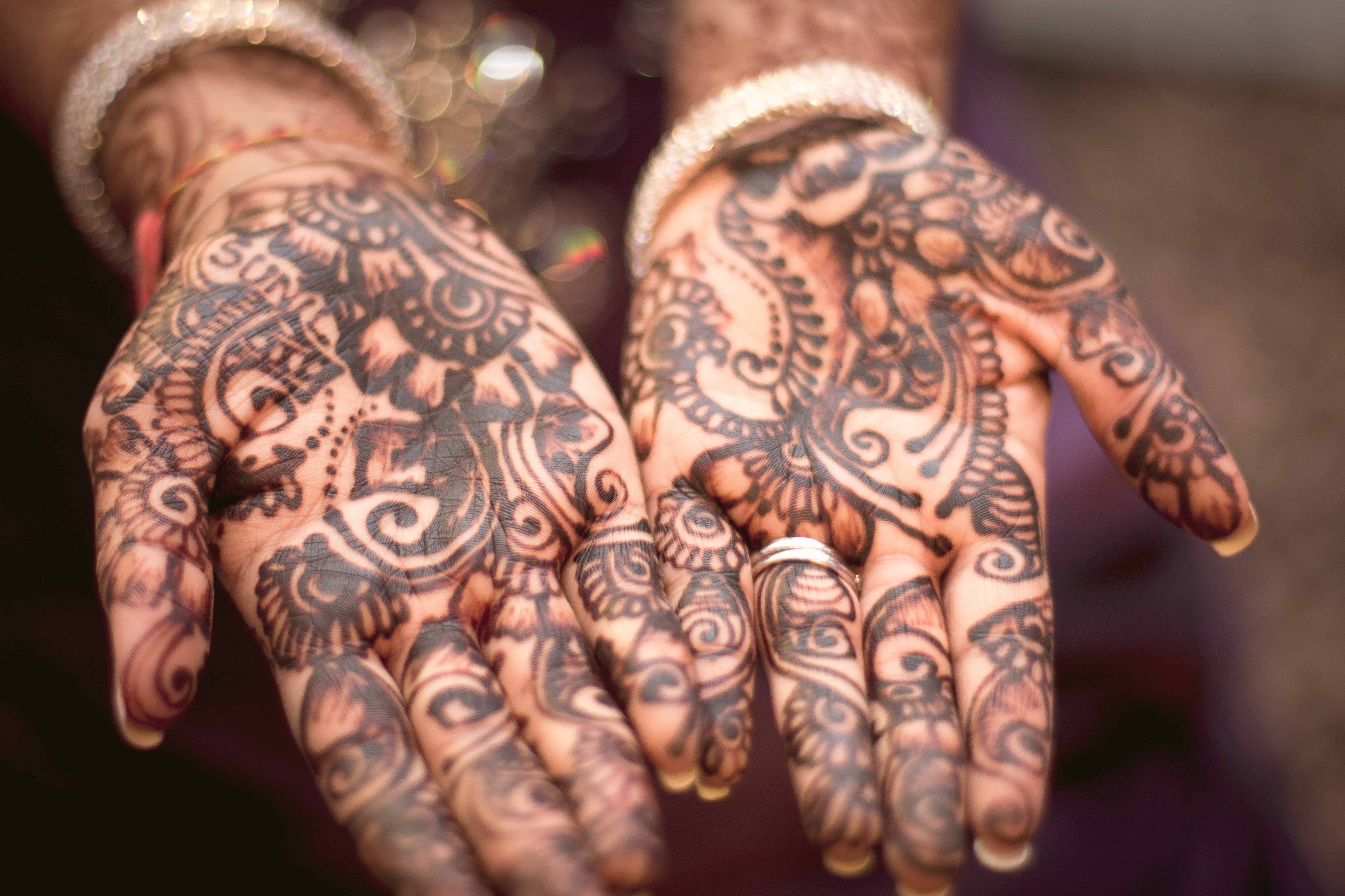 person showing hand tattoos